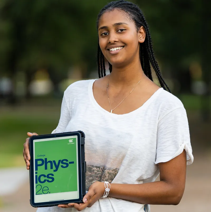 Armon, OpenStax student, holding a tablet displaying the OpenStax Physics 2e textbook